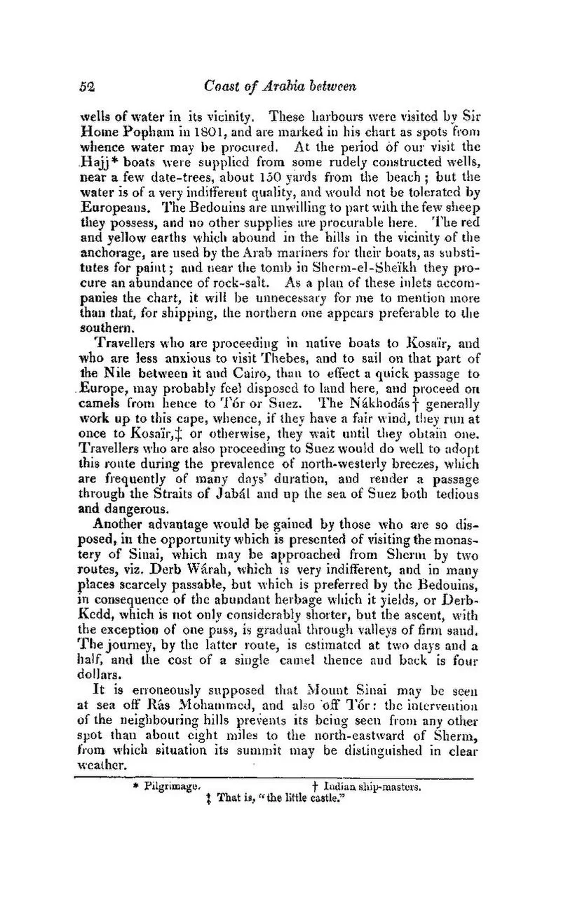 Sheer ochre cliffs plunging into deep blue water at Ras Mohammed, with coral shelves visible beneath the surface and clear skies overhead.