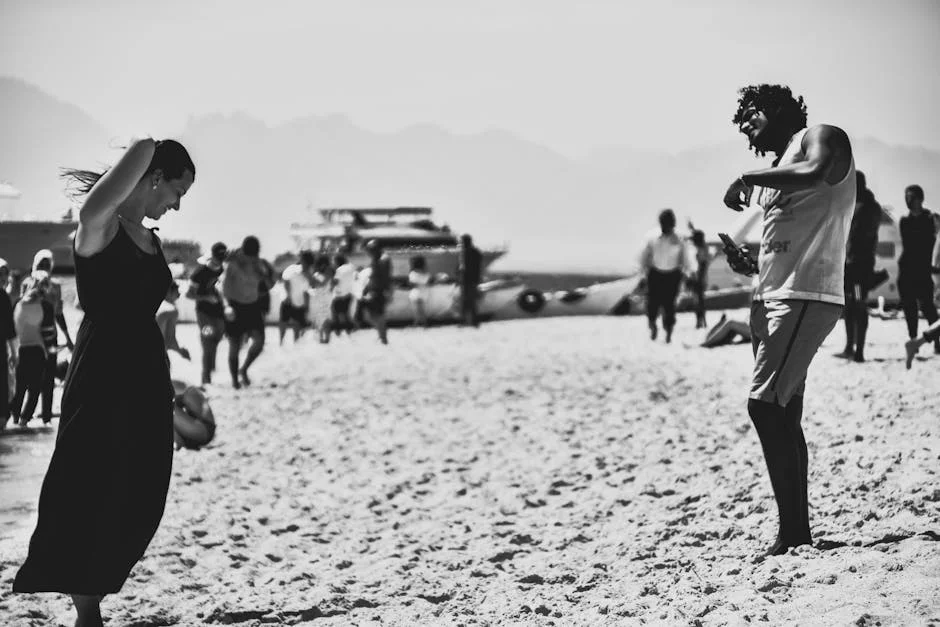 Families stepping off a boat onto a white sandbar near Orange Bay