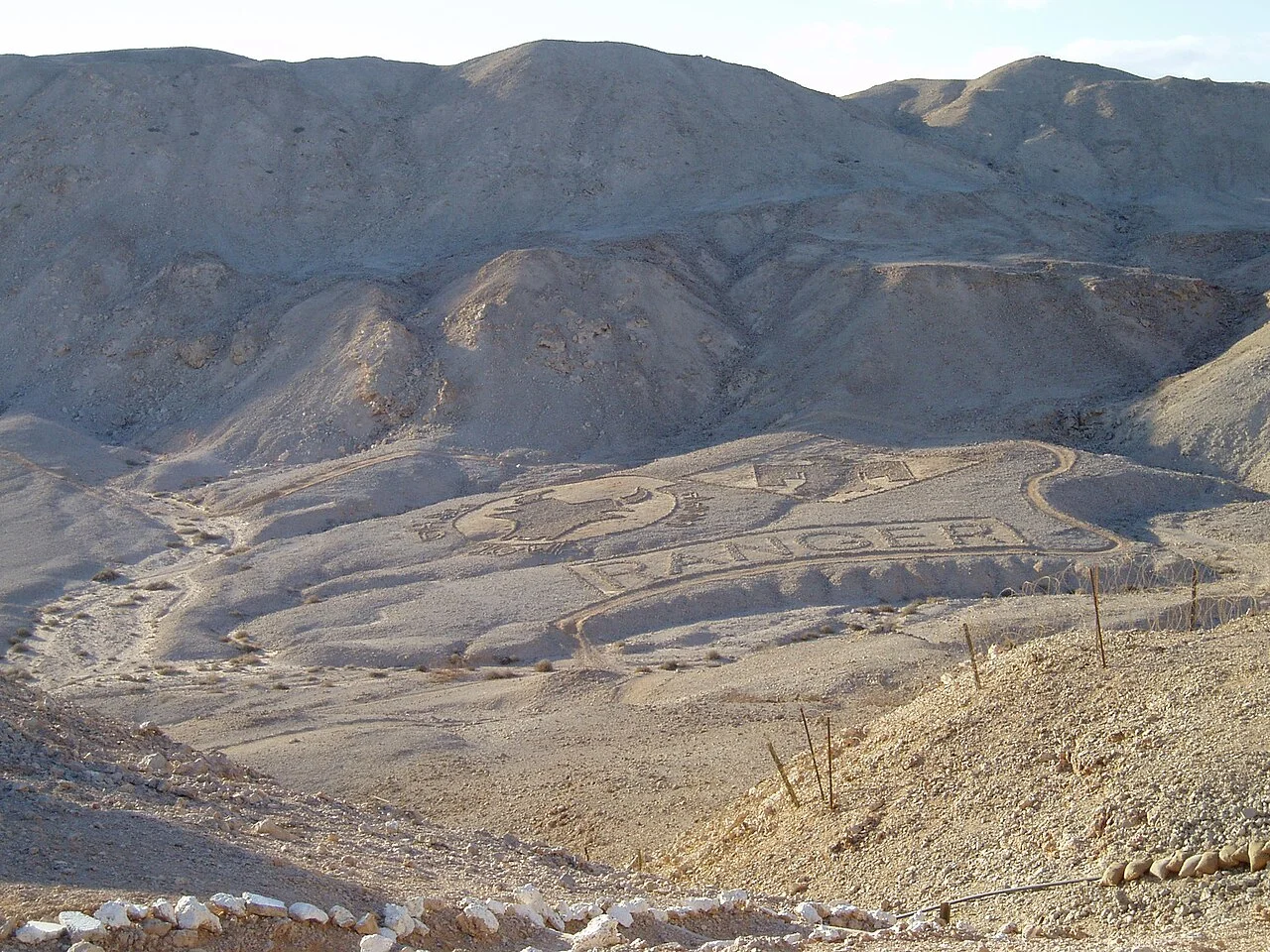 Hurghada boat rental anchored near Magawish Island sandbar with guests preparing to snorkel away from crowds